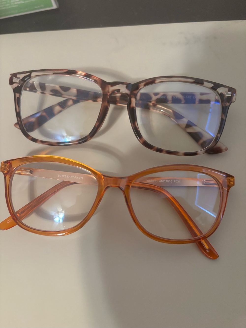 Two pack blue light glasses headache prevention great condition tortoise and miu